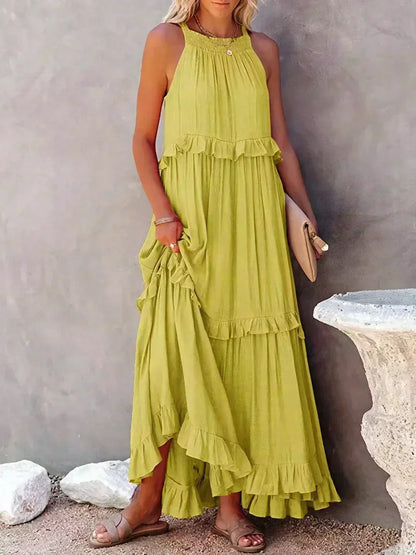 Ilona - HALTERNECK JURK MET RUFFLES EN ZAKKEN