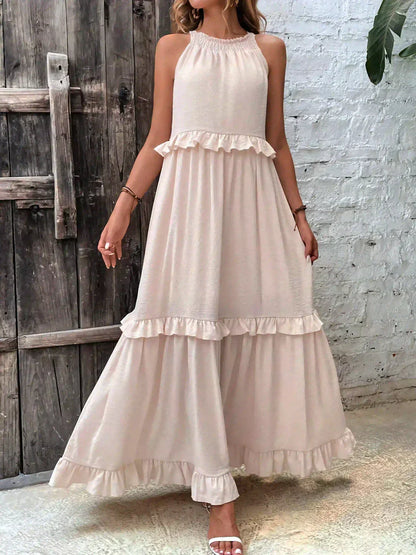 Ilona - HALTERNECK JURK MET RUFFLES EN ZAKKEN
